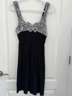 Soprano Black Scoop Neck flowy dress with ruffled floral Trim medium